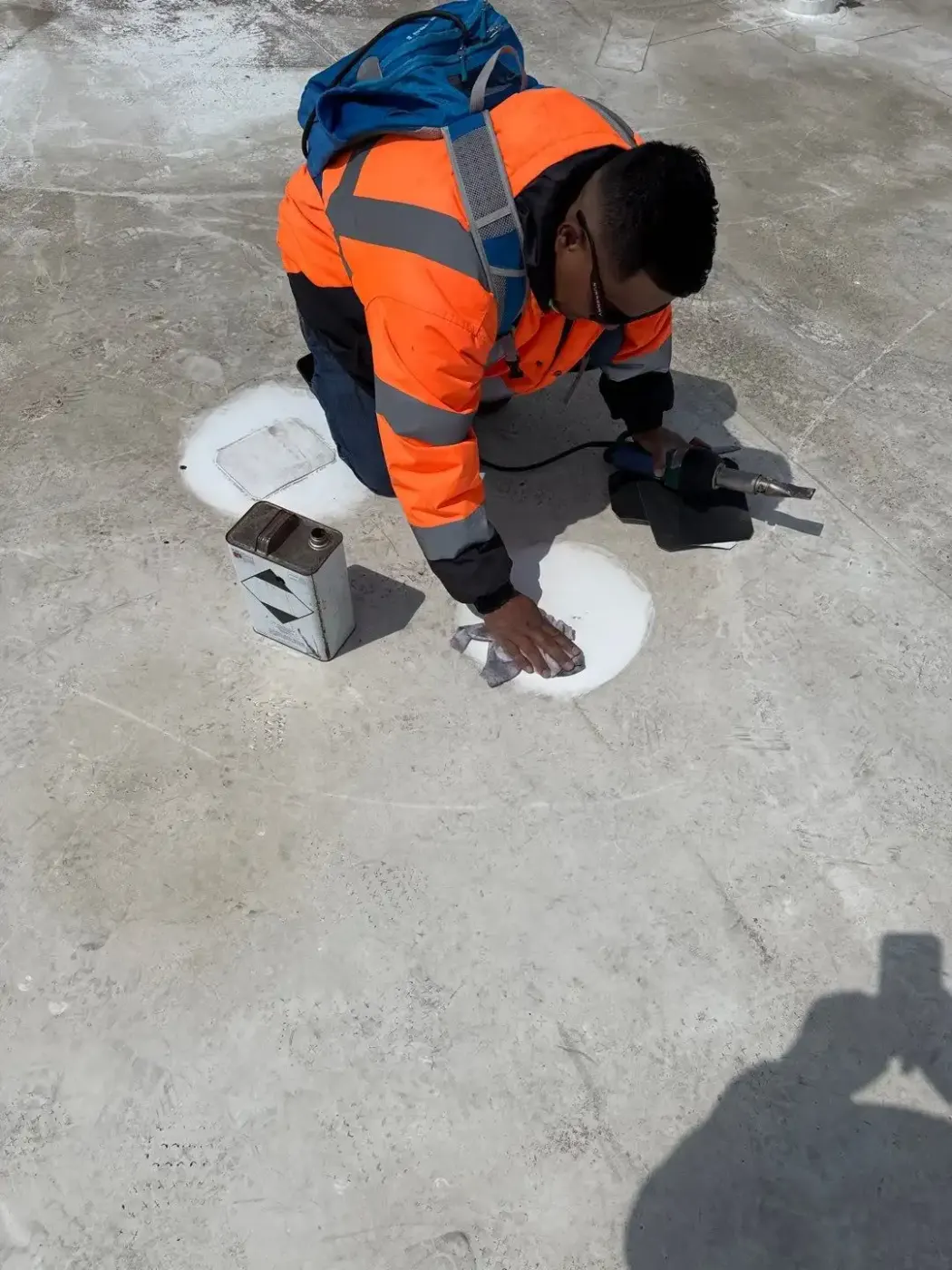 Tarping and dry-in on a Angola commercial roof